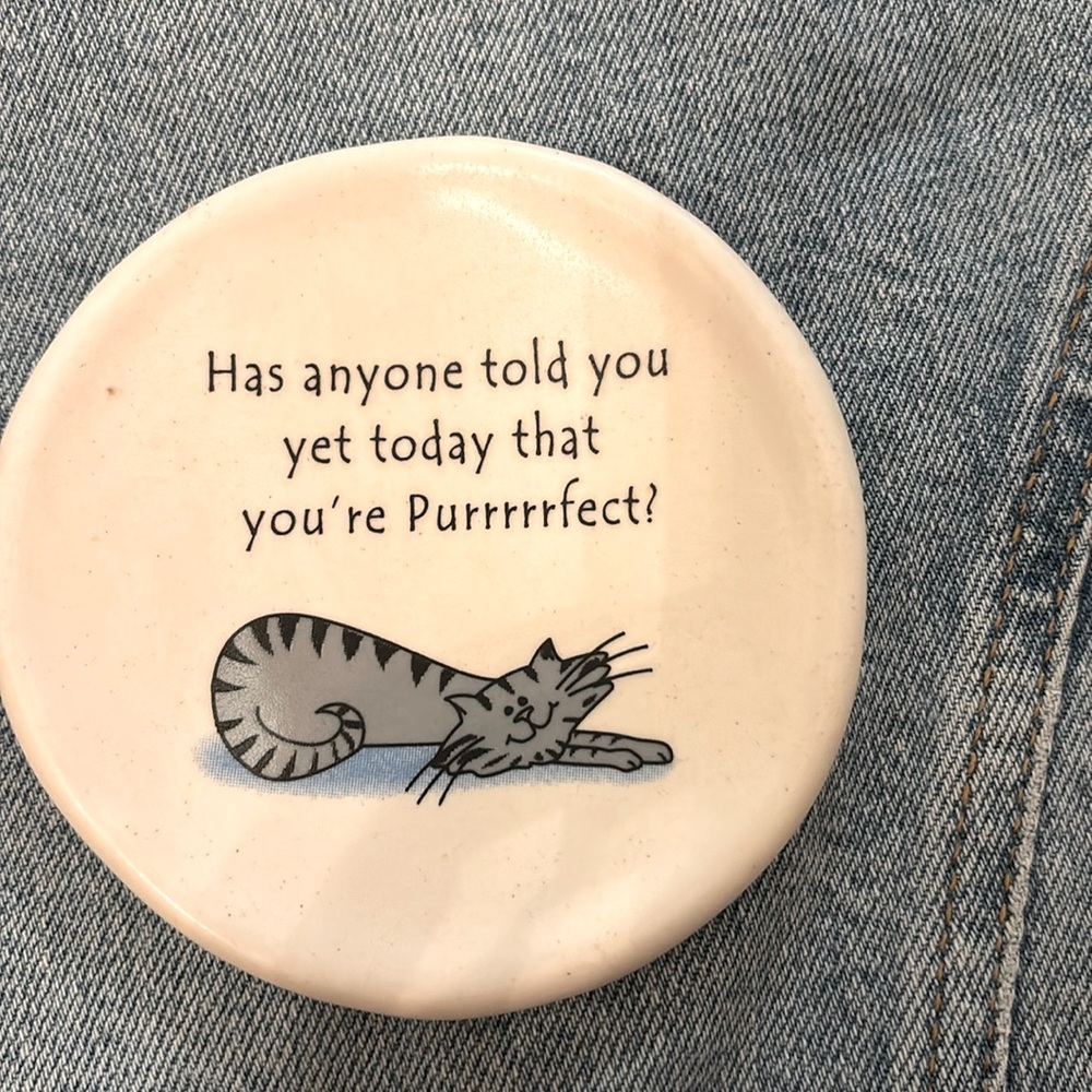 This is a little handmade ceramic trinket/ring dish from August Ceramics.